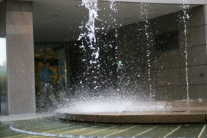 Photo of decorative water fountain mid-stream